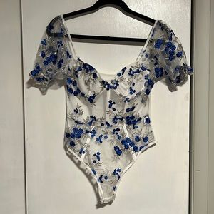Sheer, floral bodysuit from Shein. Never been worn!